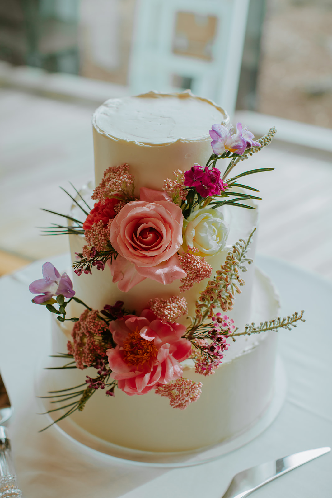Crumb Cakery - Colorful Spring Wedding Cake with Fresh Flowers
